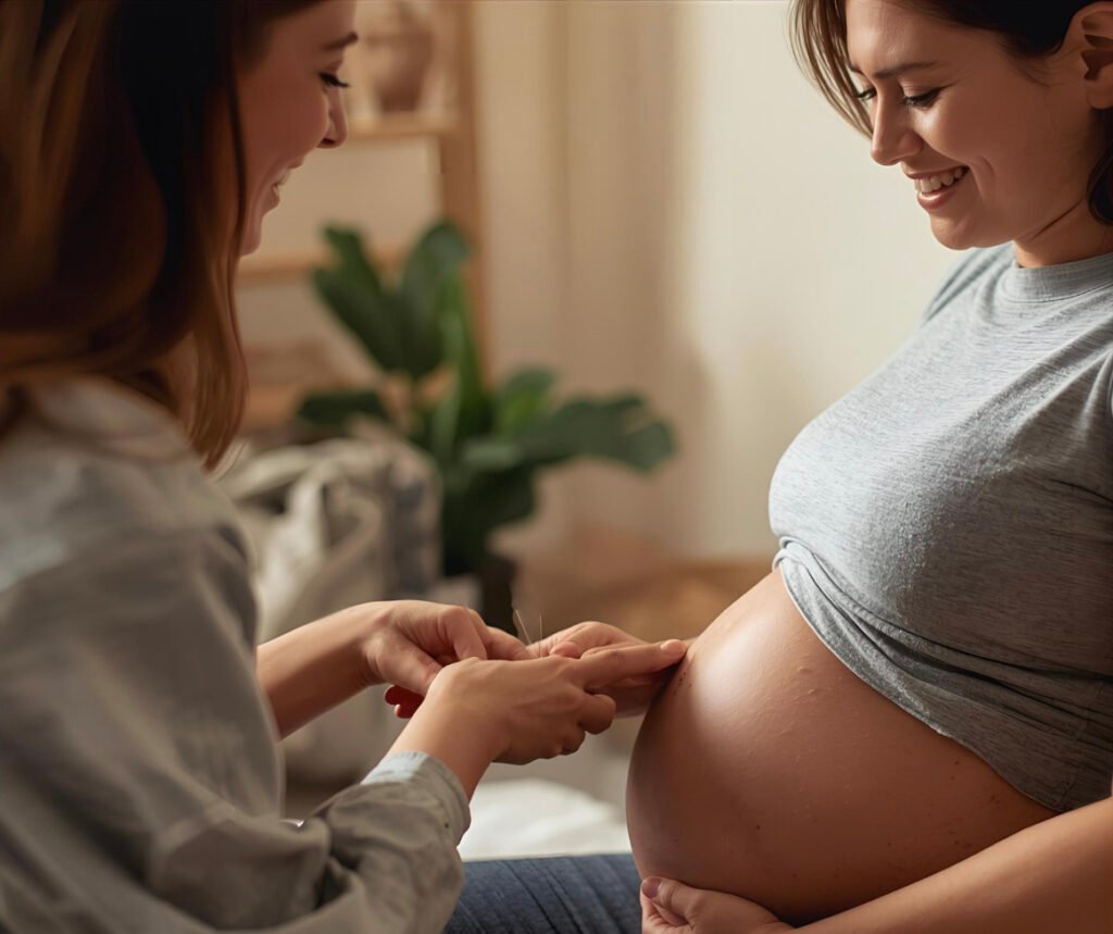 Pregnant woman receiving acupuncture treatment from a licensed practitioner to relieve pregnancy discomfort and promote maternal wellness.