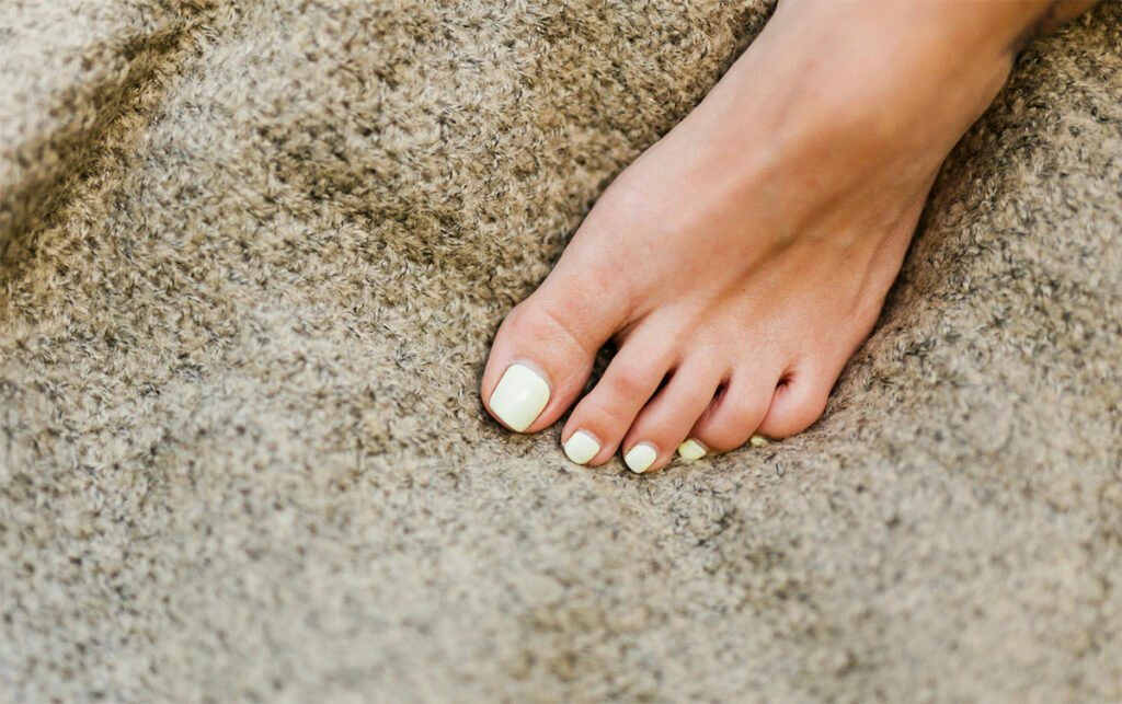 A close-up image of a lady’s foot